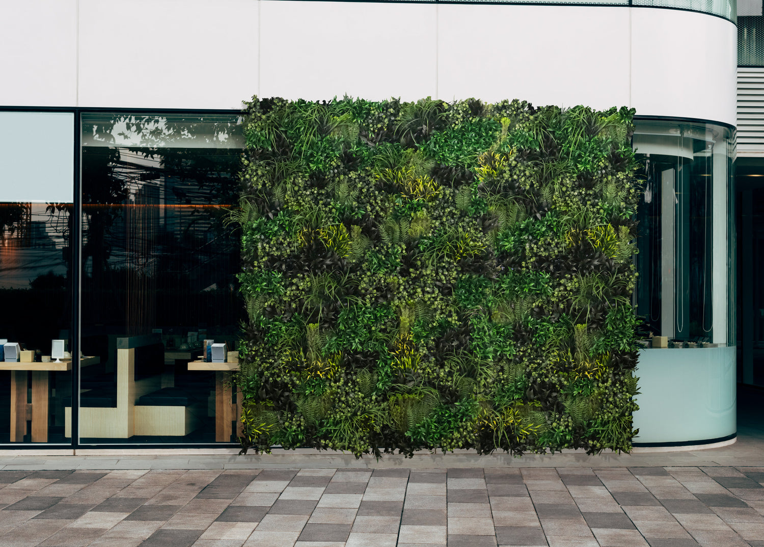 Simulated Green Spaces: Exploring the Creative Applications of Fake Plant Panels in Exterior Design