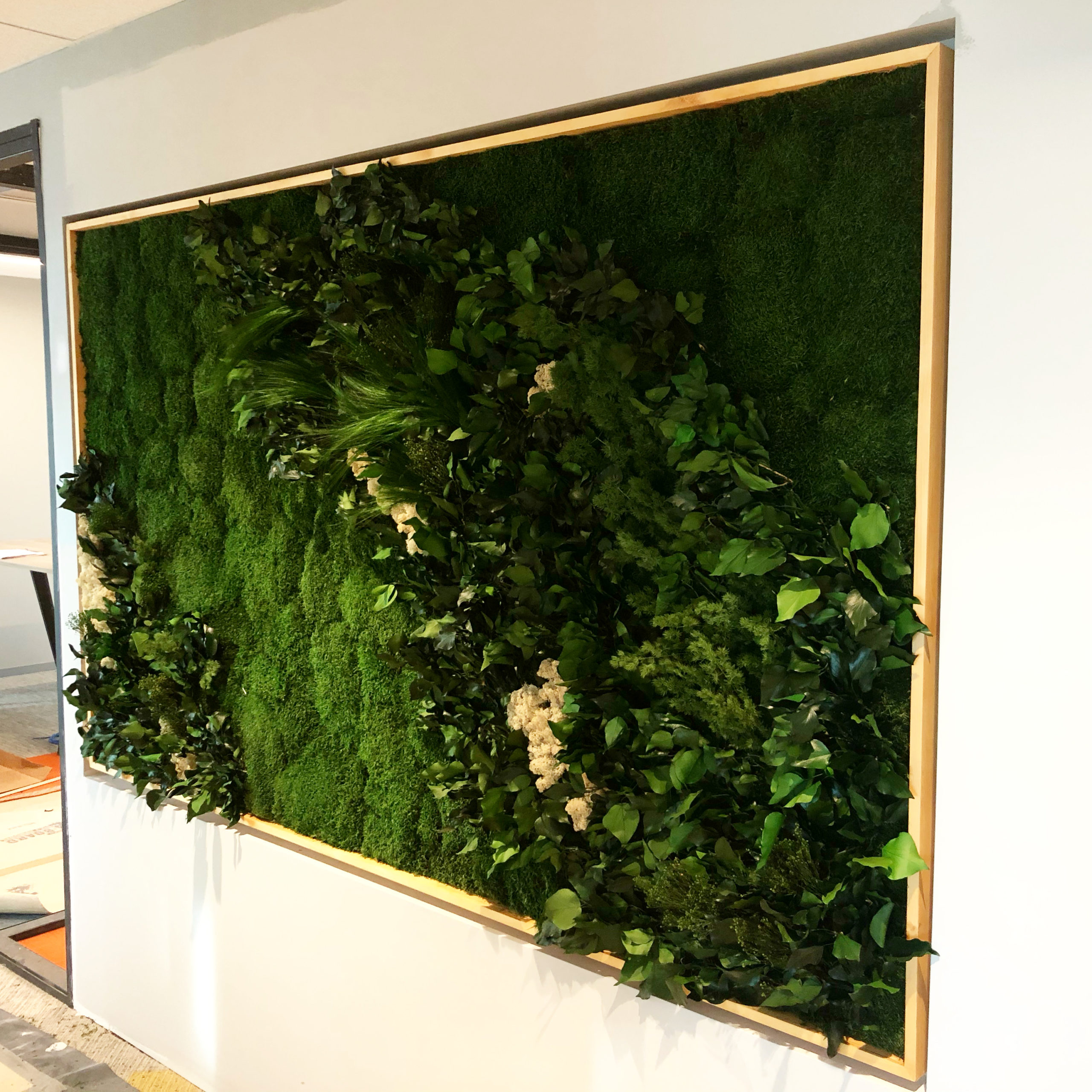 Lush and Leafy Vertical Garden Design For Offices 